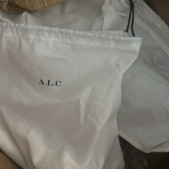ALC dust bags and 5 sweaters in large box - Picture 2 of 2